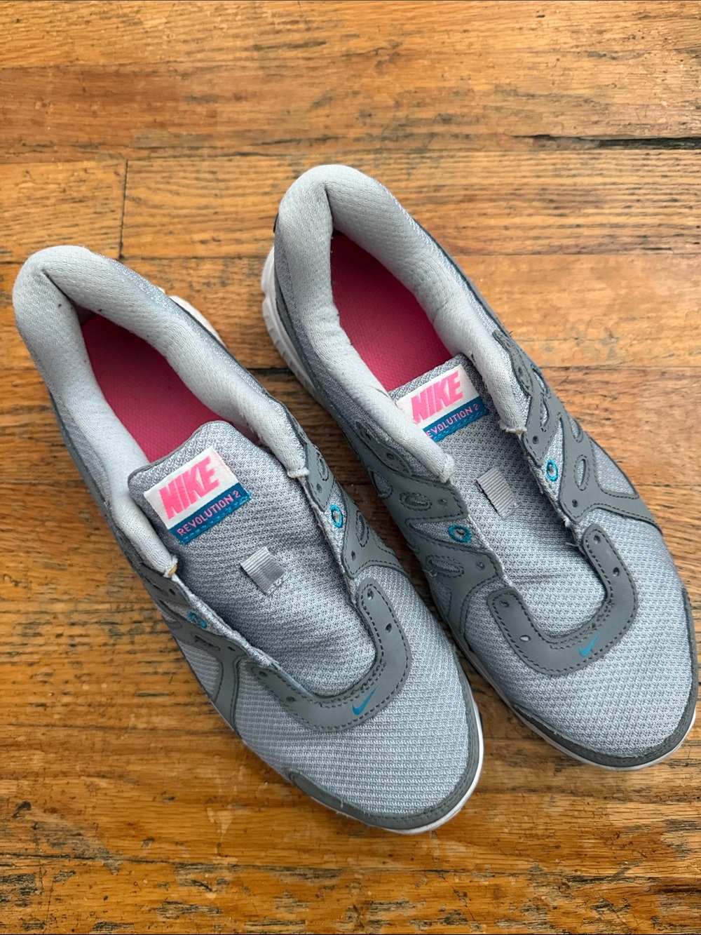 Nike Gray Athletic Shoes with Pink Lining